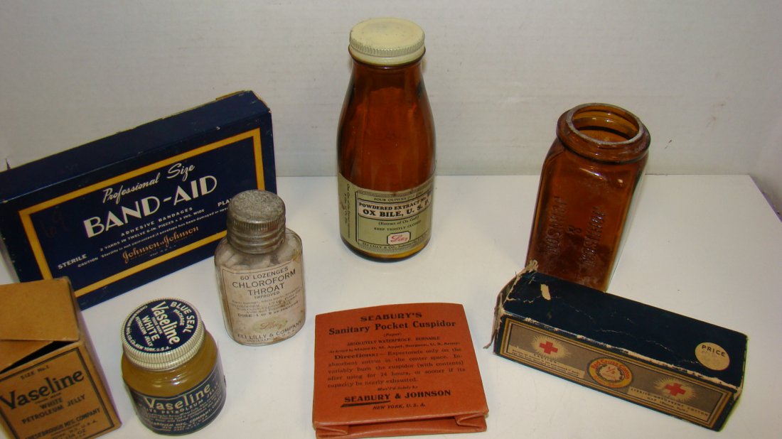 7 VARIOUS VINTAGE PHARMACY COLLECTIBLES: 7 VARIOUS VINTAGE PHARMACY COLLECTIBLES - POWDERED EXTRACT NO. 88 OX BILE MEDICINE BOTTLE - VINTAGE LILLY CHLOROFORM THROAT TABLETS BOTTLE - VINTAGE BROWN GLASS JOHNSON AND JOHNSON BOTTLE - RED CROSS 