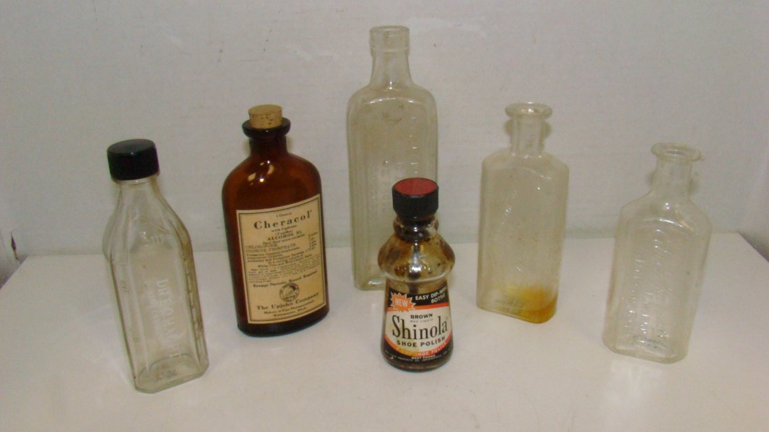 5 VINTAGE MEDICINE BOTTLES & 1 SHOE POLISH BOTTLE: 5 VARIOUS VINTAGE MEDICINE BOTTLES INCLUDING: DR. E. O. HAUPT 6'' BOTTLE - VINTAGE BAKER & COLSON PHARMACY BOTTLE - FRESNO CA PHARMACY - 5.25'' - VINTAGE CITY PHARMACY F.W. RUHSER CLEAR GLASS BOTTLE F