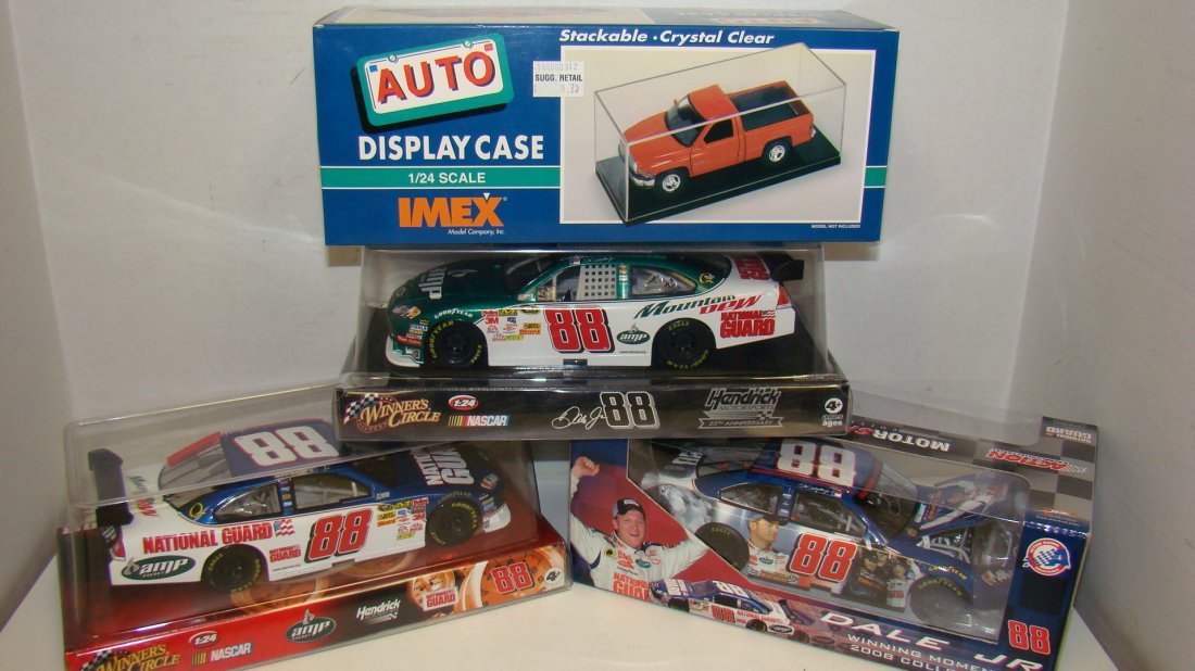3 VARIOUS NIB #88 DIE-CAST CARS & DISPLAY CASE: WINNER'S CIRCLE NIB 1/24 SCALE #88 DALE JR/NATIONAL GUARD/AMP CAR - WINNERS CIRCLE NIB #88 DALE JR/MOUNTAIN DEW/NATIONAL GUARD - 2008 ACTION NIB MOTORSPORT #88 DALE JR/AMP/NATIONAL GUARD PLUS A NIB IM