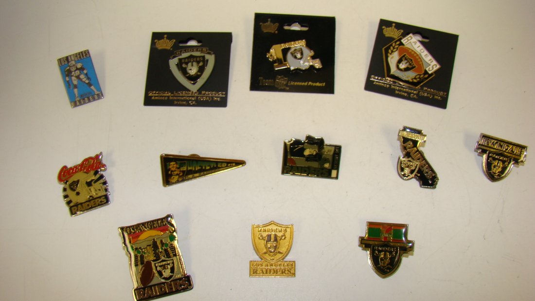 12 VARIOUS LA RAIDERS LAPEL PINS: 12 VARIOUS LOS ANGELES RAIDERS NFL LAPEL PINS - COCA-COLA PIN - STATE OF CALIFORNIA PIN - PENNANT PIN AND OTHERS