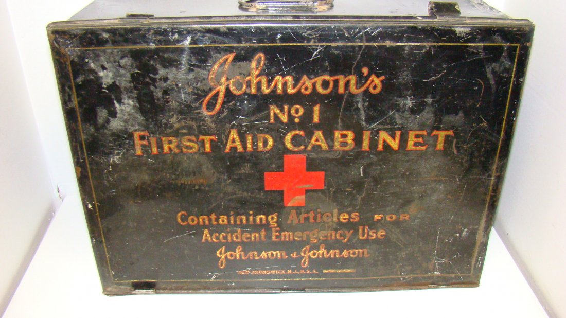 VINTAGE METAL JOHNSON'S NO. 1 FIRST AID CABINET: VINTAGE JOHNSON'S NO. 1 FIRST AID CABINET - BLACK WITH RED AND GOLD LETTERING - FRONT READS ''CONTAINING ARTICLES FOR ACCIDENT EMERGENCY USE - INSIDE DRAWERS ARE PRINTED WITH WHAT GOES IN EACH DRAWER