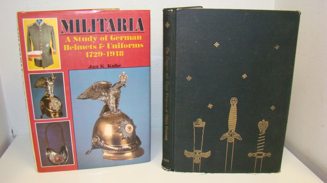 2 BOOKS ON NAZI COLLECTIBLES: 1965 FIRST EDITION - THE DAGGERS AND EDGED WEAPONS OF HITLER'S GERMANY - BY MAJOR JAMES P. ATWOOD - OUTSIDE COVER IS WORN AND BINDING IS COMING LOOSE AND 1990 EDITION - MILITARIA A STUDY OF GERMAN HEL