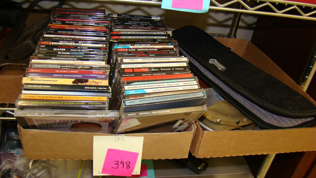 APPROX 60 CD'S, CANNON POWER SHOT AND MORE: VARIOUS CDS - TOY HOLSTER AND PADDED ZIP UP CASE - CANNON DIGITAL CAMERA - A80 POWER SHOT- 4 MEGA PIXELS, 32 MB MEMORY CARD - APPROX 60 CD'S INCLUDE - MARILYN MANSON, ROB ZOMBIE, METALLICA, NINE INCH 
