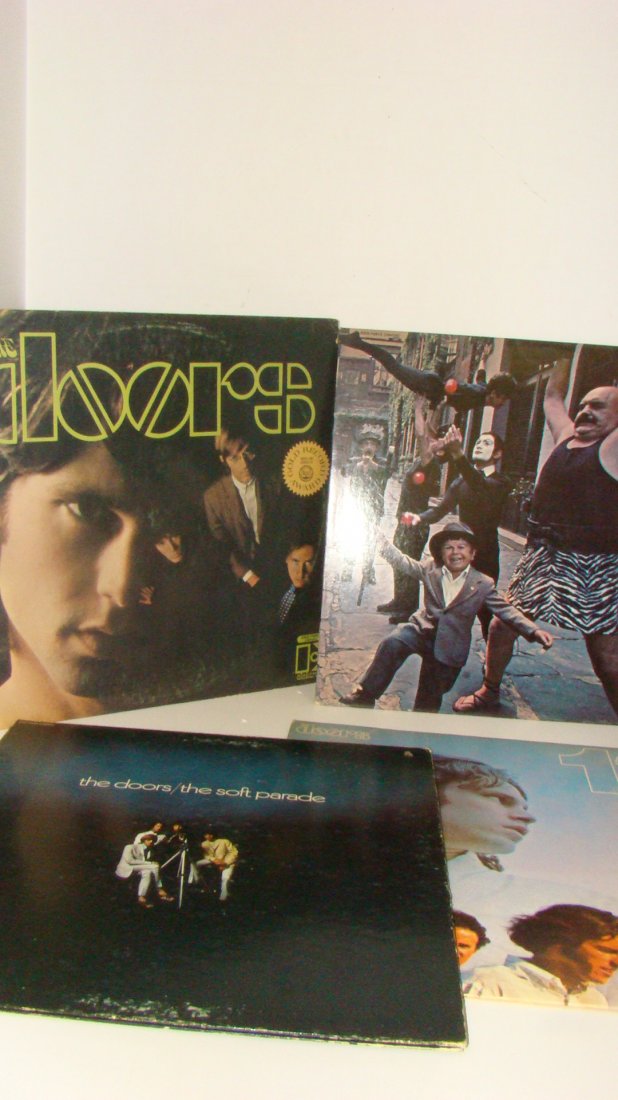 4 VINTAGE ''THE DOORS'' RECORD ALBUMS: 4 VARIOUS VINTAGE RECORD ALBUMS ''THE DOORS'' - EKS-74007 STEREO - GOLD RECORD AWARD - ELEKTRA RECORDS - COVER SHOWS WEAR - STRANGE DAYS - STEREO EKS-74014 - ELEKTRA RECORDS - COVER SHOWS SOME WEAR - 