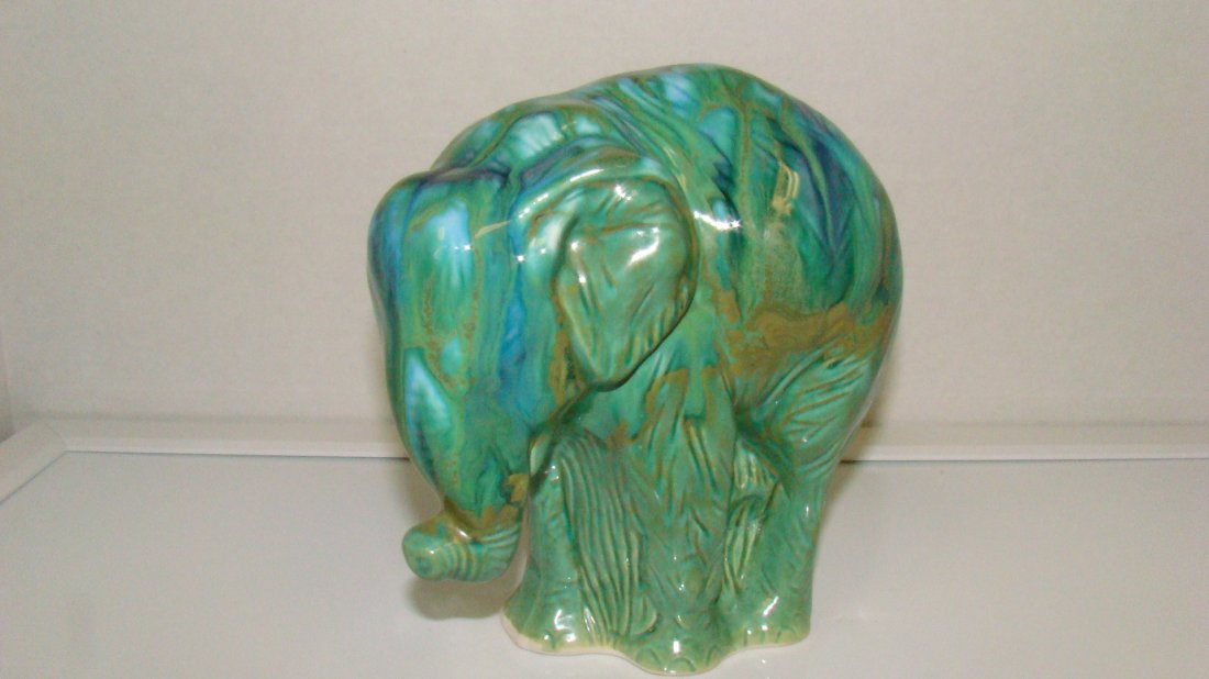 GREEN POTTERY ELEPHANT: GREEN GLAZED POTTERY ELEPHANT - APPROX 7''x 6'' - GOOD CONDITION