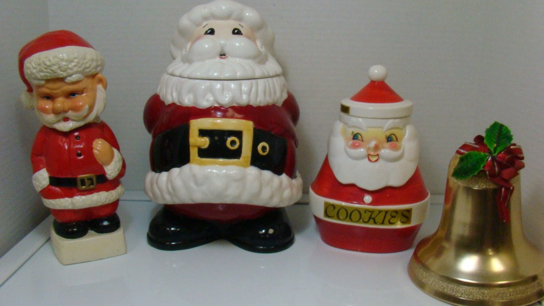3 SANTAS AND A LIGHTED BELL: 12'' CERAMIC SANTA CLAUS COOKIE JAR - NO MARKS - GOOD CONDITION - 3 PIECE SANTA CANDY JAR - MARKED ON BOTTOM BUT CAN'T MAKE IT OUT - 9.75'' SANTA CLAUS BOBBLE HEAD AND A BELL LIGHT