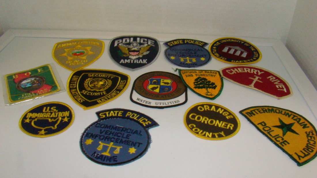 13 VARIOUS LAW ENFORCEMENT PATCHES: 13 VARIOUS US LAW ENFORCEMENT SHOULDER PATCHES - AMTRACK POLICE - (2) MAINE STATE POLICE COMMERCIAL VEHILE ENFORCEMENT - INTERMOUNTAIN SECURITY POLICE - THE UNIVERSITY OF ARTS PUBLIC SAFETY - ORANGE C