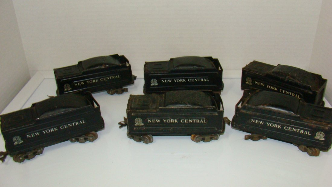 6 VINTAGE MARX TIN LITHO TENDER CARS: 6 VINTAGE MARX TIN LITHO TENDERS - USED CONDITION - SOME RUST - NO BOXES - SOME PAINT LOSS - ONE IS MISSING WHEELS - 3 ARE MISSING 1 WHEEL BASE - NEW YORK CENTRAL - FROM THE COLLECTION OF A 97 YEAR OL