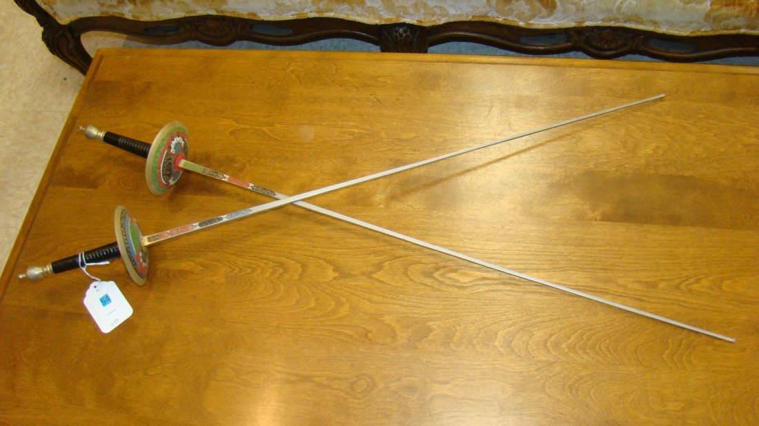 PAIR OF DECORATIVE METAL SWORDS (1 of 3)