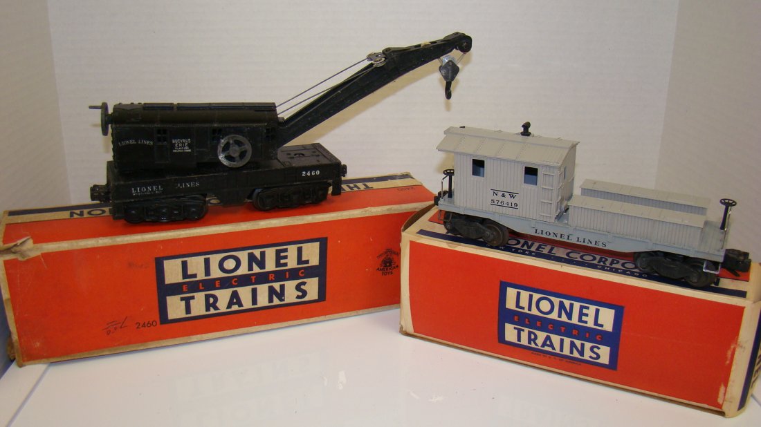 LIONEL NO. 2460 CRANE CAR & LIONEL NO. 6419 CABOOS: VINTAGE LIONEL NO. 2460 WRECKING CRANE - BUCYRUS ERIE - UNTESTED - ORIGINAL BOX - ENDS ARE OFF THE BOX AND IS DIRTY AND WRITTEN ON - LIONEL NO. 6419 WRECKER CABOOSE - UNTESTED - ORIGINAL BOX - BOX IS 