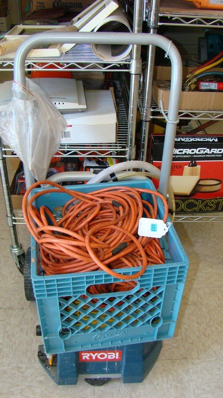 RYOBI PAINT SPRAYER CART ONLY & EXT CORDS: USED RYOBI PAINT SPRAYER CART (NO PAINT SPRAYER JUST THE CART) AND A PLASTIC MILK CRATE WITH VARIOUS EXTENSION CORDS - BUYER RESPONSIBLE FOR MAKING SHIPPING ARRANGEMENTS