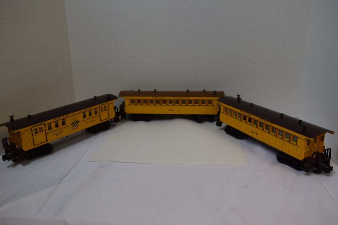 2 LIONEL WESTERN & ATLANTIC PASSENGER & U.S. MAIL: 2 LIONEL WESTERN & ATLANTIC PASSENGER & U.S. MAIL CARS. 1875W WHISTLING PASSENGER CAR, 1865 PASSENGER CAR, 1876 W & A.R.R. W.S. MAIL CAR. ALL WHEELS ARE NICE AND CLEAN. MINOR PAINT SCRATCHES ON ALL CA