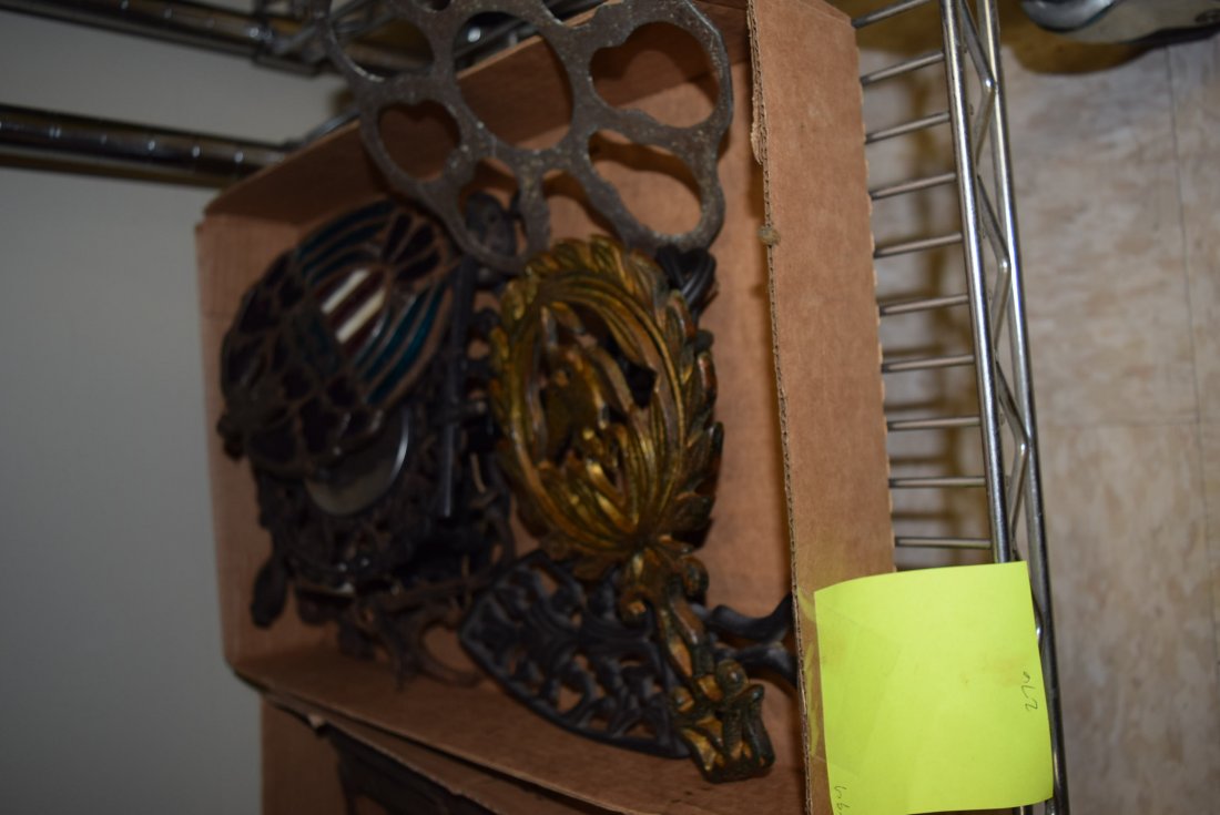 ANTIQUE CAST IRON TRIVETS (1 of 2)