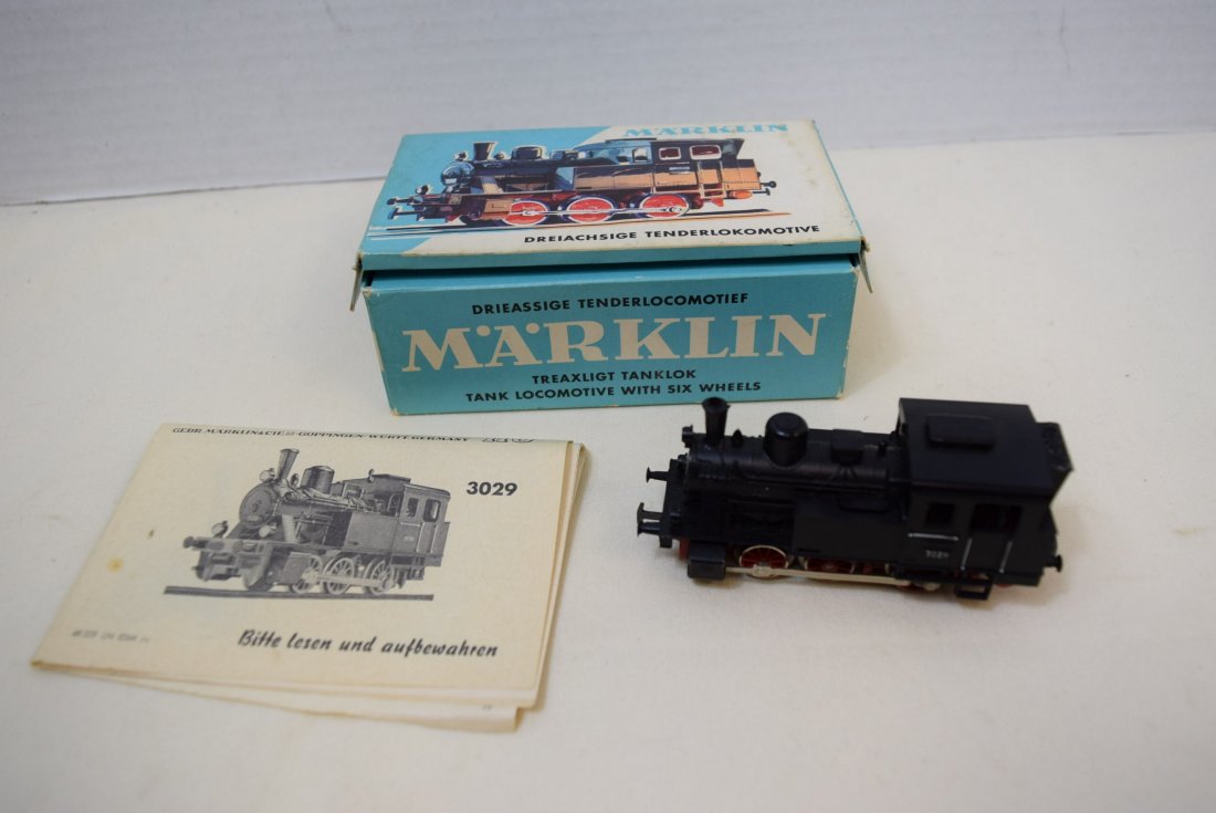 MARKLIN HO LOCOMOTIVE 3029 IN ORIGINAL BOX: MARKLIN HO LOCOMOTIVE 3029 IN ORIGINAL BOX WITH INSTRUCTIONS. BOX NOT SEALED. LOCOMOTIVE AND WHEELS ARE NICE AND CLEAN. UNTESTED.