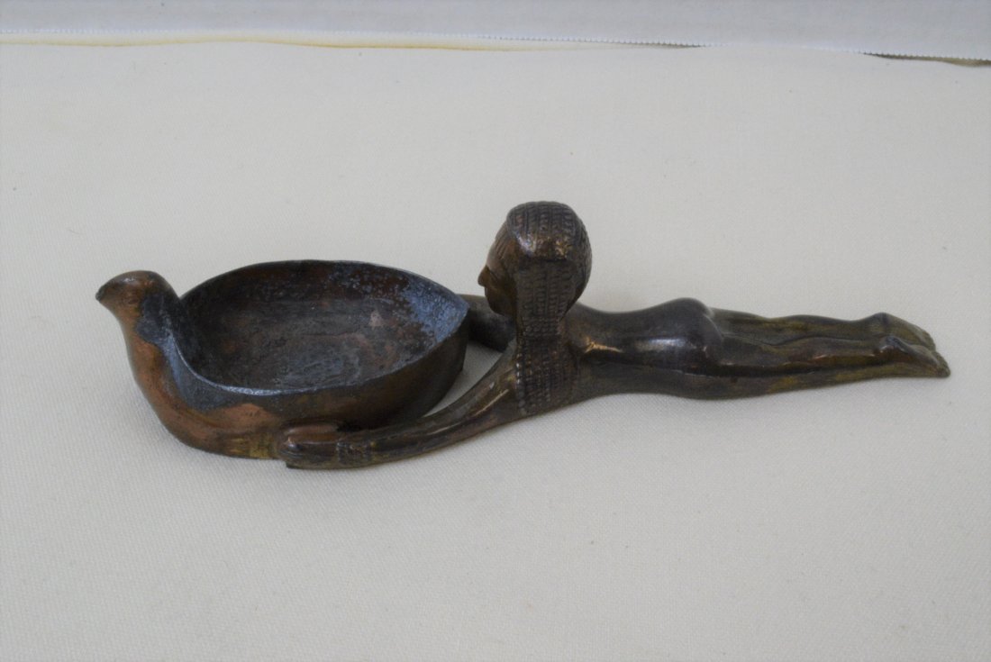 ART DECO EGYPTIAN INCENSE BURNER: ART DECO EGYPTIAN INCENSE BURNER-EGYPTIAN LADY LAYING DOWN- BRONZE IN COLOR-PATINA-BOWL SHAPED LIKE BIRD-MADE IN JAPAN-APPROXIMATELY 6''L