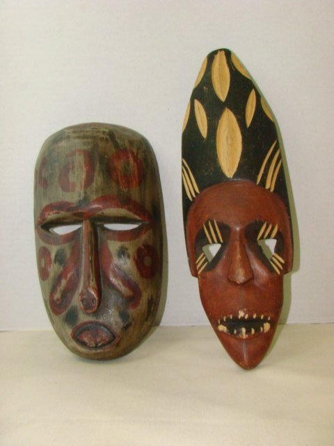 2 TRIBAL MASKS-INDONESIA: 2 TRIBAL MASKS-INDONESIA & UNKNOWN-INDONESIA MASK OBLONG RED CIRCLES-WRITING ON BACK 12''X6''. UNKNOWN MASK-TRIANGLE EYES-DIAMOND SHAPED-RED & BLACK-15''X5''