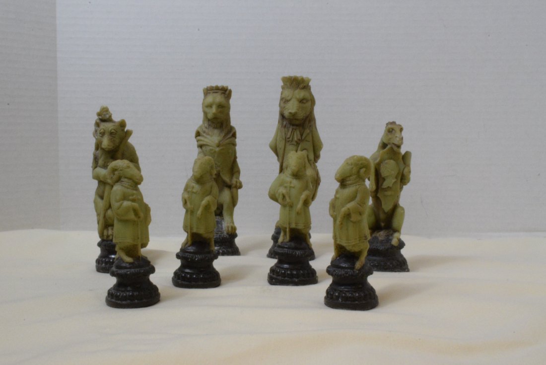 GREEN FIGURAL PIECES: GREEN FIGURAL PIECES-LIONS-GOATS-HORSE-RATS WITH MONKEY-APPEAR TO BE OLD CHESS PIECES. 8 PIECES ONLY-PURPLE FELT BOTTOMS-SOME WEAR MARKS-NOT COMPLETE