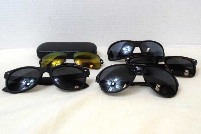 5 STYLES OF SUNGLASSES: 5 STYLES OF SUNGLASSES-PUGSGEAR STYLE 1604-YELLOW LENSES. BROWN FRAME SQUARE LENSE 540676 TAC POLARIZED. BLACK RUBBER LIKE FRAME-LARGE BLUE LENSES PS3012. BLACK RUBBER LIKE FRAME-SQUARE BLUE LENSES-SM