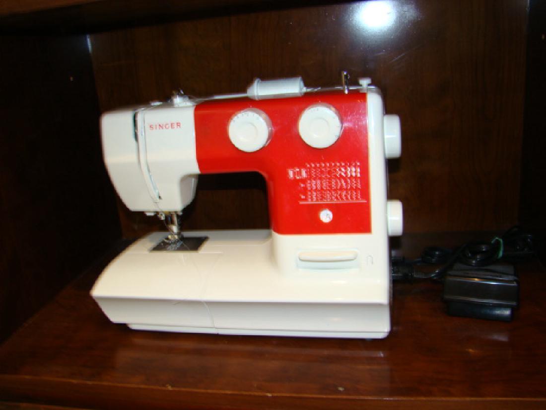 SINGER SEWING MACHINE: SINGER SEWING MACHINE- WHITE WITH RED FRONT-PICTURE OF STITCHES FOR EASY CHOOSING - MODEL NUMBER 1748-SERIAL NUMBER ZHC527711307
