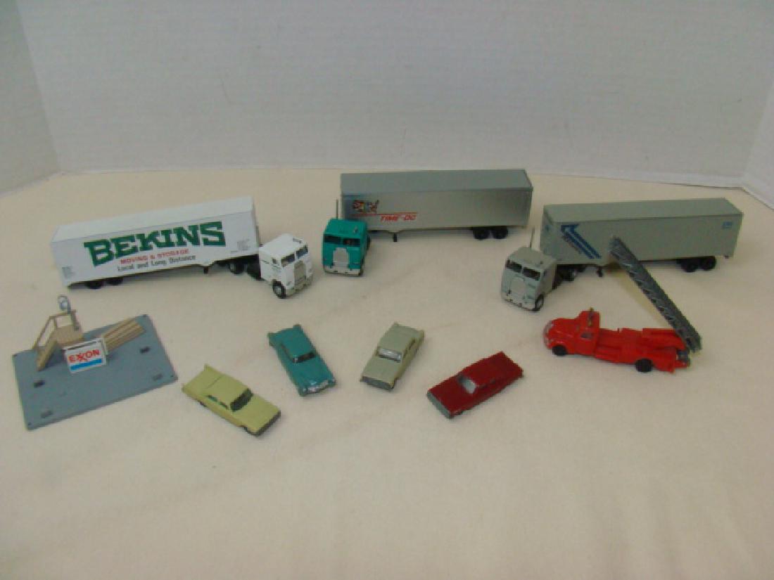 HO SCALE - FORD CARS & 3 SEMIS WITH TRAILERS: HO SCALE - 4 EKO FORD CARS-EKO LADDER FIRE ENGINE & BEKINS SEMI & TRAILER-TIME-DC SEMI & TRAILER & REA EXPRESS SEMI & TRAILER-MAKER UNKNOWN-ALL APPEAR COMPLETE