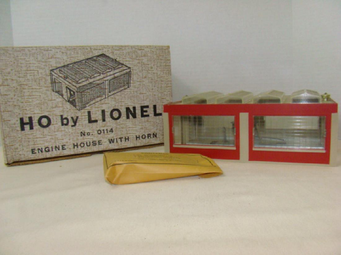 LIONEL TRAINS-HO SCALE ENGINE HOUSE WITH HORN - NI: LIONEL TRAINS-HO SCALE ENGINE HOUSE WITH HORN - NIB WITH INSTRUCTIONS & HORN STILL SEALED IN ORIGINAL PARTS ENVELOPE- BOX HAS MINIMAL DAMAGE