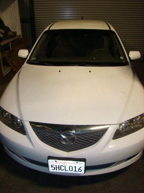 2004 MAZDA 6 - WHITE: 2004 MAZDA 6 - WHITE- APPROX 121,500 MILES-VIN NUMBER 1YVFP82D345N754-THIS CAR RUNS INCLUDING HEAT-STEREO ETC-NEEDS A SIDE DOOR WINDOW REPLACEMENT- NICE WHEELS-NICE LOOK-SOME MINOR BODY DINGS/AND OR D