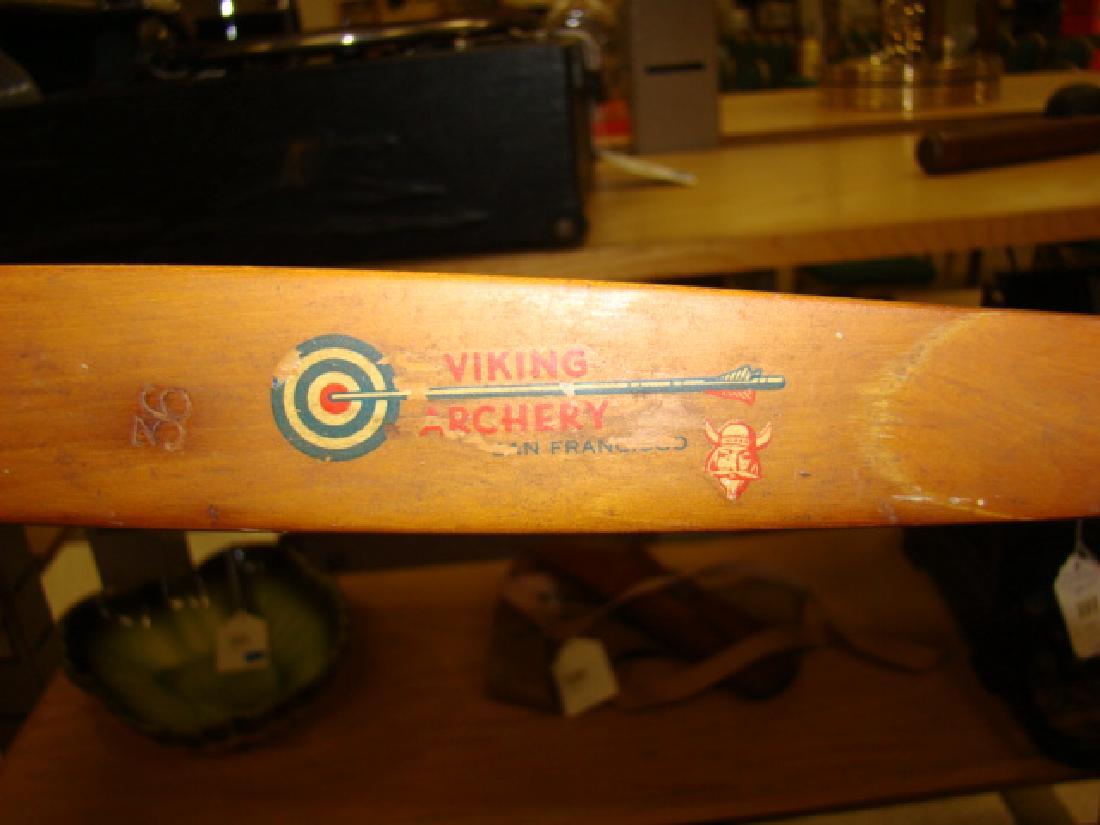 VIKING BOW AND ARROWS: VIKING ARCHER BOW AND ARROWS - MADE IN SAN FRANCISCO-9 ARROWS-TWO ARE MISSING CAPS-ONE WITH ARROW TIP-OTHERS HAVE METAL TIPS NO ARROWS-ONE MISSING ARROW-WITH VINYL TYPE CASE-ROPE TIED TO IT-NEEDS BOW