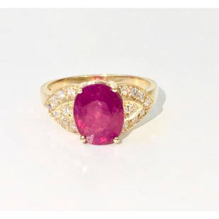 14K Yellow Gold, 4.50 CT Ruby and VS Diamond Ring: 14K yellow gold. 4.50 Carat ruby. Beautiful intense red color. Oval shape, set in prongs. Side diamonds: 0.40 CTs. VS clarity and F color. Extremely gorgeous ring.