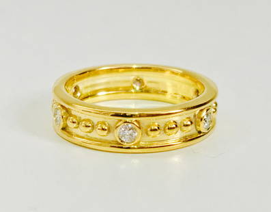 Classic Boutique French Style Diamond and Gold Band: 18K yellow gold. 0.48 Carat diamonds. G color VS clarity diamonds. 100% natural earth mined diamonds set in bezel setting. Classic vintage boutique diamond and gold band. Perfect for unisex ring for