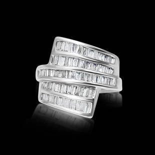 Ladies Superlative 3.00 CT Diamond & Gold Cocktail Ring: 14K White Gold. Fabulous 3.00 carat bageutte cut diamonds. VS-SI Clarity - G color. Diamonds set in channel setting. All diamonds are 100% natural and earth mined. Collectible ladies fine jewelry