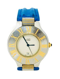 Cartier 21 Must de Cartier, Gold & Steel Date Watch: Brand: Cartier. Model: Must de 21 Cartier. 100% authentic and genuine. Steel and Gold. Roman dial in gold. Original Cartier leather band. Sapphire glass. Clasp: fold. Clasp material: stainless steel.