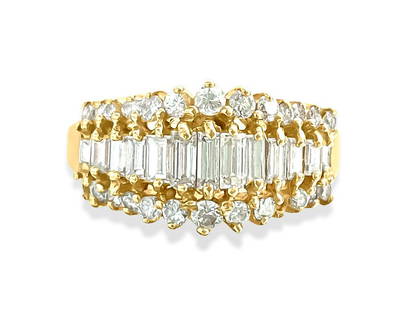 1.00 Carat Diamond and Yellow Gold Engagement Ring: Metal: 14K yellow gold.Total carat weight of the diamonds: 1.00 carats. Round brilliant and baguette cut diamonds set in prongs. VS clarity and F-G color.Ring size: US 6.25. Weight: 4.11 grams. Free