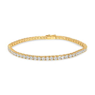Unisex 6.00ct Diamond 14k Yellow Gold Tennis Bracelet: Metal: 14k yellow gold. 6.00 carat diamonds total. Round brilliant cut. VVS-VS diamonds. 100% natural earth mined diamonds. 3mm width. 7 inches long. 8.73 grams. Unisex tennis bracelet. Clean