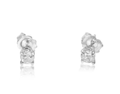 14K white gold, 0.50 CT old mine diamond earrings/studs: 14K white gold. 0.50 carat diamonds. SI clarity and G color. Old mine cut diamond. Beautiful studs. Push back earrings/ studs. Excellent jewelry to gift at engagements, weddings, anniversaries,