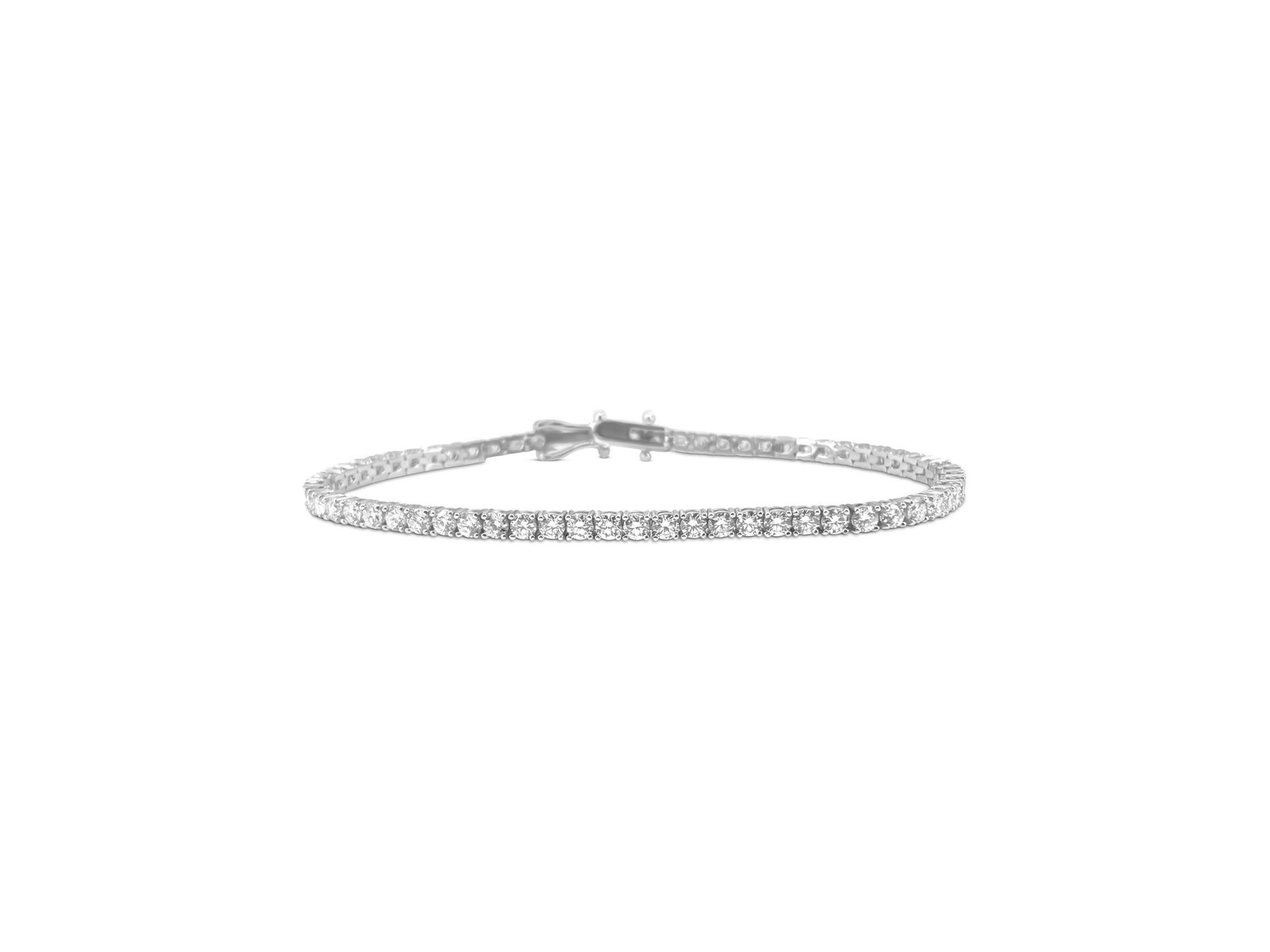 6.50ct Diamond Tennis Braclet. VVS Diamonds in 14k Gold: Metal: 14k white gold. 6.50 CWT diamonds. VVS clarity. H-I color. Round brilliant cut diamonds. 100% natural earth mined diamonds. 7 inches. Unisex diamond tennis bracelet