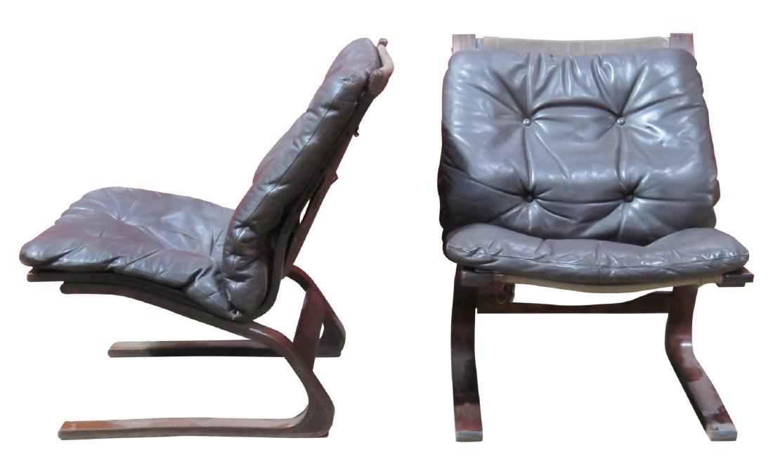 Pair INGMAR A. RELLING for WESTNOFA "SIESTA" LOUNGE: Leather tufted cushions and backs. Sling back legs. 30 3/4"h. x 25 1/4"w. x 31"d.