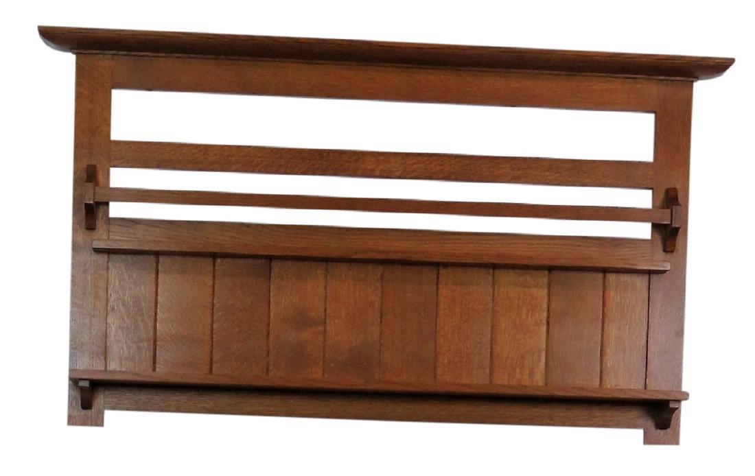 STICKLEY OAK SLATTED WALL SHELF: Oak slatted frame. 27"h. x 48 1/4"w. x 4 3/4"d.