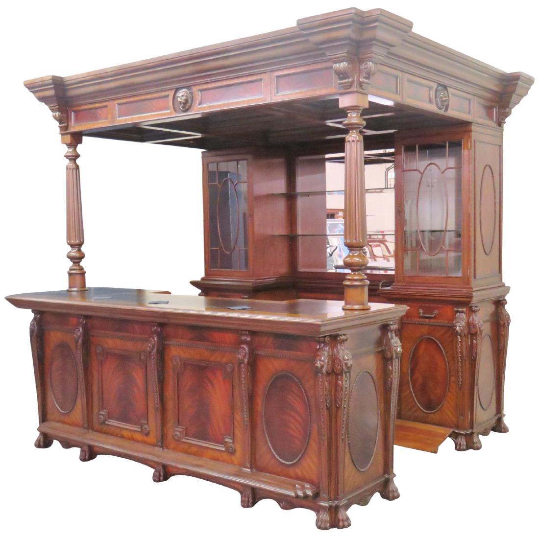 MAITLAND SMITH CARVED WALNUT BAR w/ LION'S HEADS: Carved walnut with burl walnut panels. Only a handful made. The back bar is configured to support two wine fridges as it is vented and with electrical outlets. The sink in plumbed and ready for connec