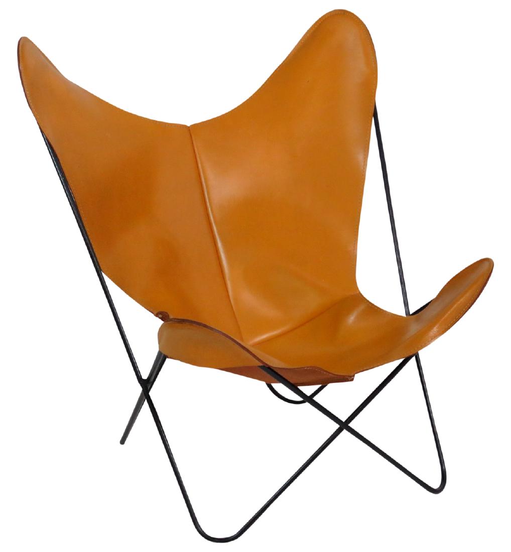 KNOLL STYLE LEATHER BUTTERFLY CHAIR: Brown leather. Black metal frame. 37"h. x 32 1/2"w. x 26 1/2"d.