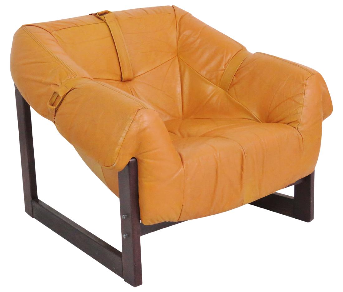 "LAFFER" BRAZILIAN ROSEWOOD & LEATHER LOUNGE CHAIR: Brown leather seat. Rosewood frame. 28"h x 33 1/2"w x 31 1/4"d