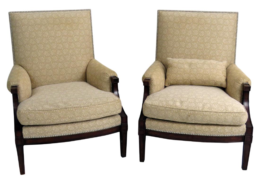 Pair DIRECTOIRE BERGERES: Floral upholstery. Nail head trim. One pillow. Ebonized trim on back of chairs. 38 1/4"h x 31"w x 32"d. Seat height 17 1/4".