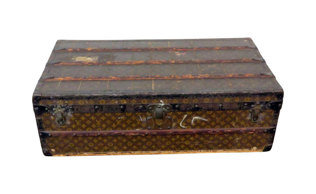 LOUIS VUITTON TRUNK: Metal mounts. 13"h x 39 1/4"w x 21 1/4"d