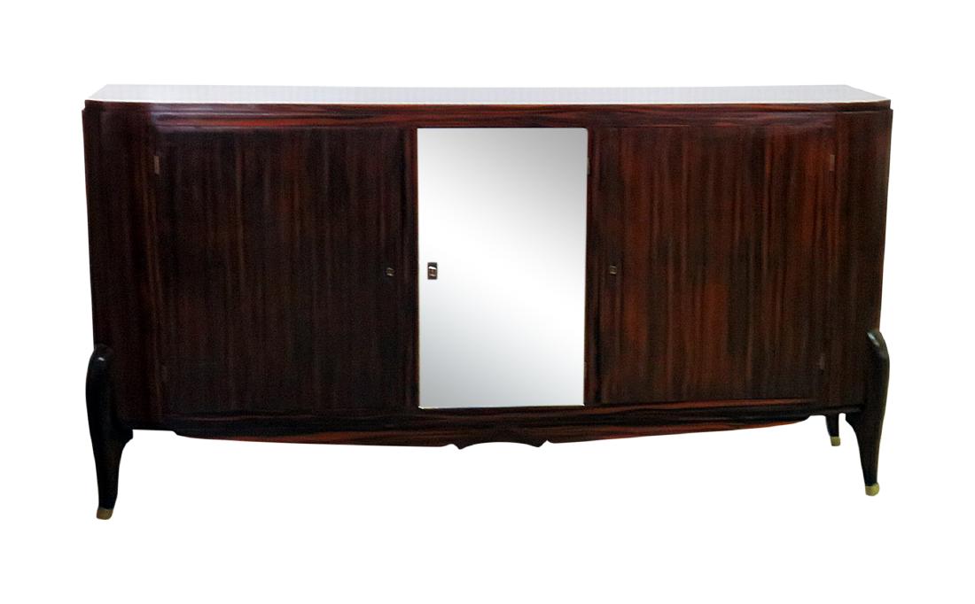 FRENCH DECO MIRRORED FRONT CREDENZA manner RUHLMANN: Rosewood. Three doors. Center door mirrored. Brass sabots. NO KEY. DOORS LOCKED. 40 1/4" h x 78 1/2" w x 20" d.