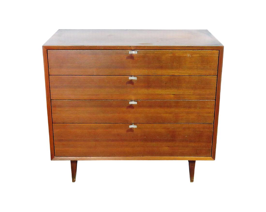HERMAN MILLER WALNUT COMMODE: Walnut. Four drawers. 29 3/4" h x 34" h x 18 1/2" d.