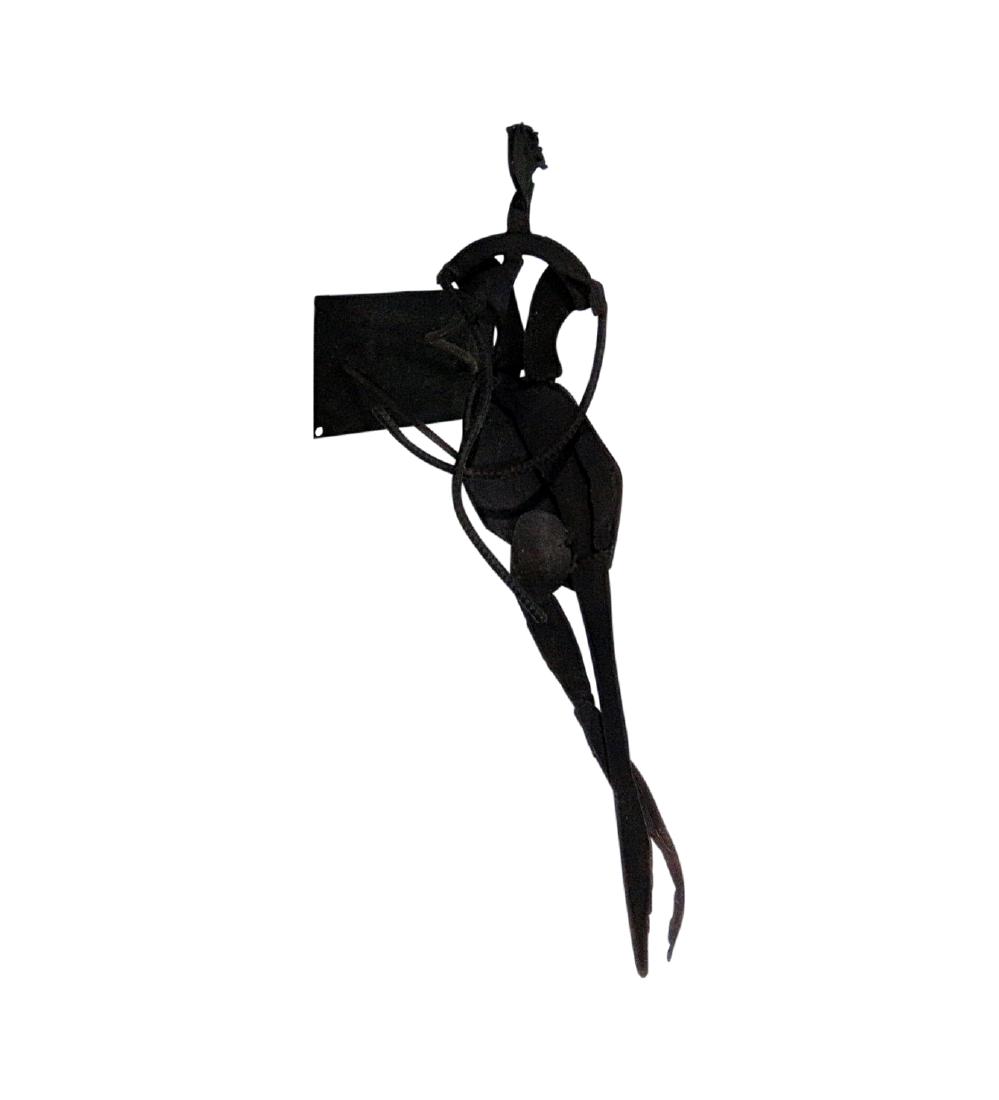 METAL FIGURAL SCULPTURE of WOMAN: Wall mounted. 29 1/4" h x 12" w x 21" d.