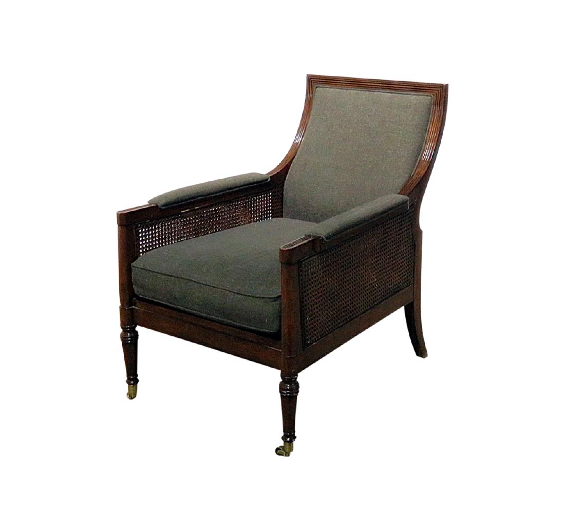 RALPH LAUREN LIBRARY CHAIR: Cane sides. Front legs on casters. Upholstered seat and back. 37 1/8" h x 26 1/4" w x 38" d. Seat height 20 1/4".