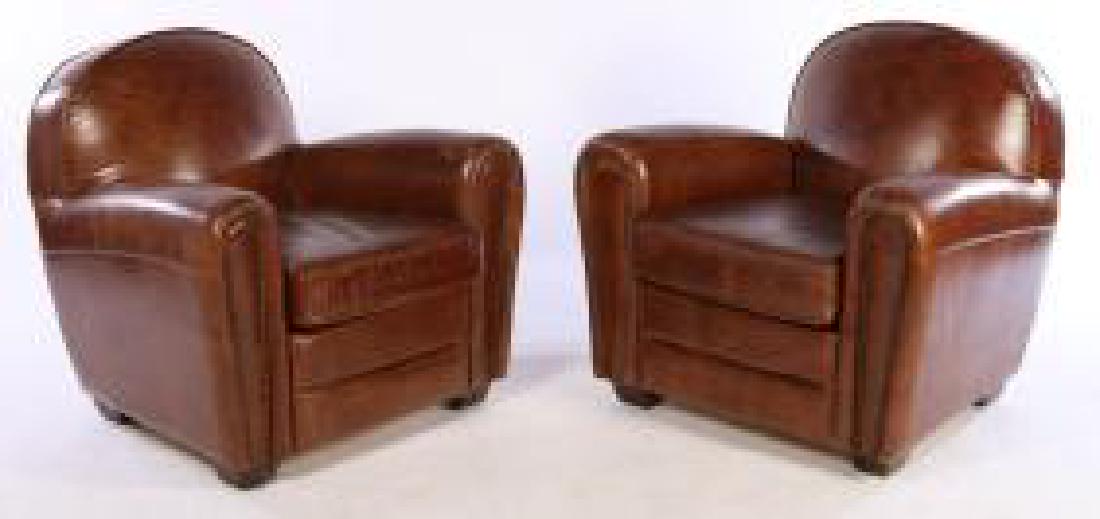 Pair FRENCH ART DECO STYLE LEATHER CLUB CHAIRS: Distressed leather. Nail head trim. Tapered feet. 31" h x 32" w x 29" d.