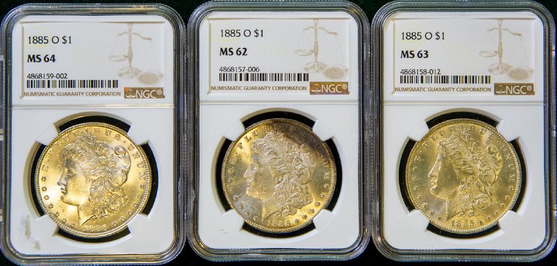 TWO 1885 O MORGAN SILVER DOLLARS $1 and 1885 MORGAN (1 of 2)