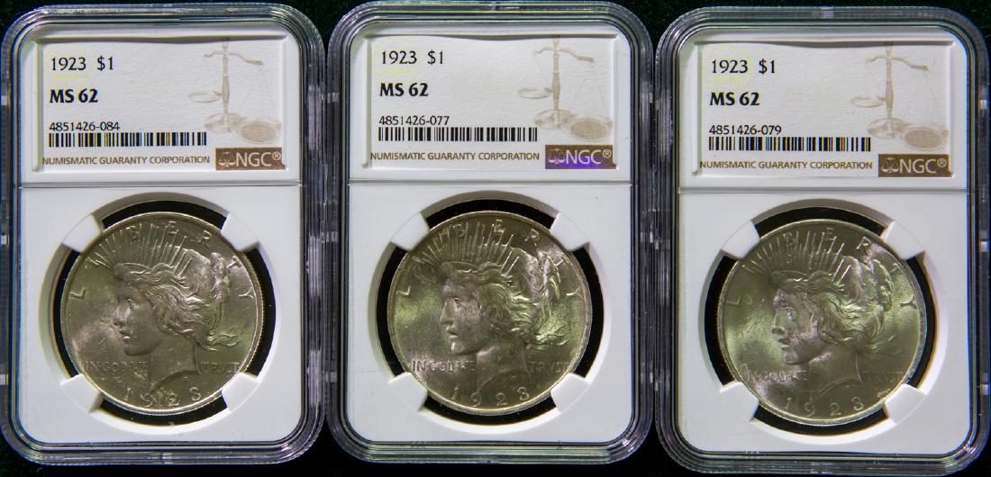 THREE 1923 PEACE SILVER DOLLARS $1 (1 of 2)