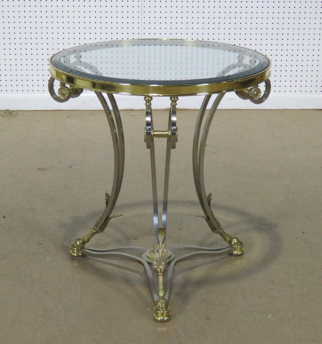 JANSEN STYLE GLASS TOP GUERIDON: Chrome and brass frame. Beveled glass top. 25 7/8" h x 26 1/2" diameter.